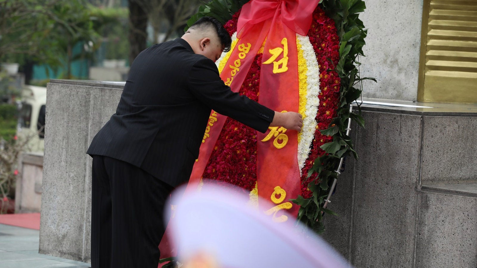 North Korean Leader Kim Jong-un Visits Vietnam and lays a red, white, and yellow wreath in Hanoi