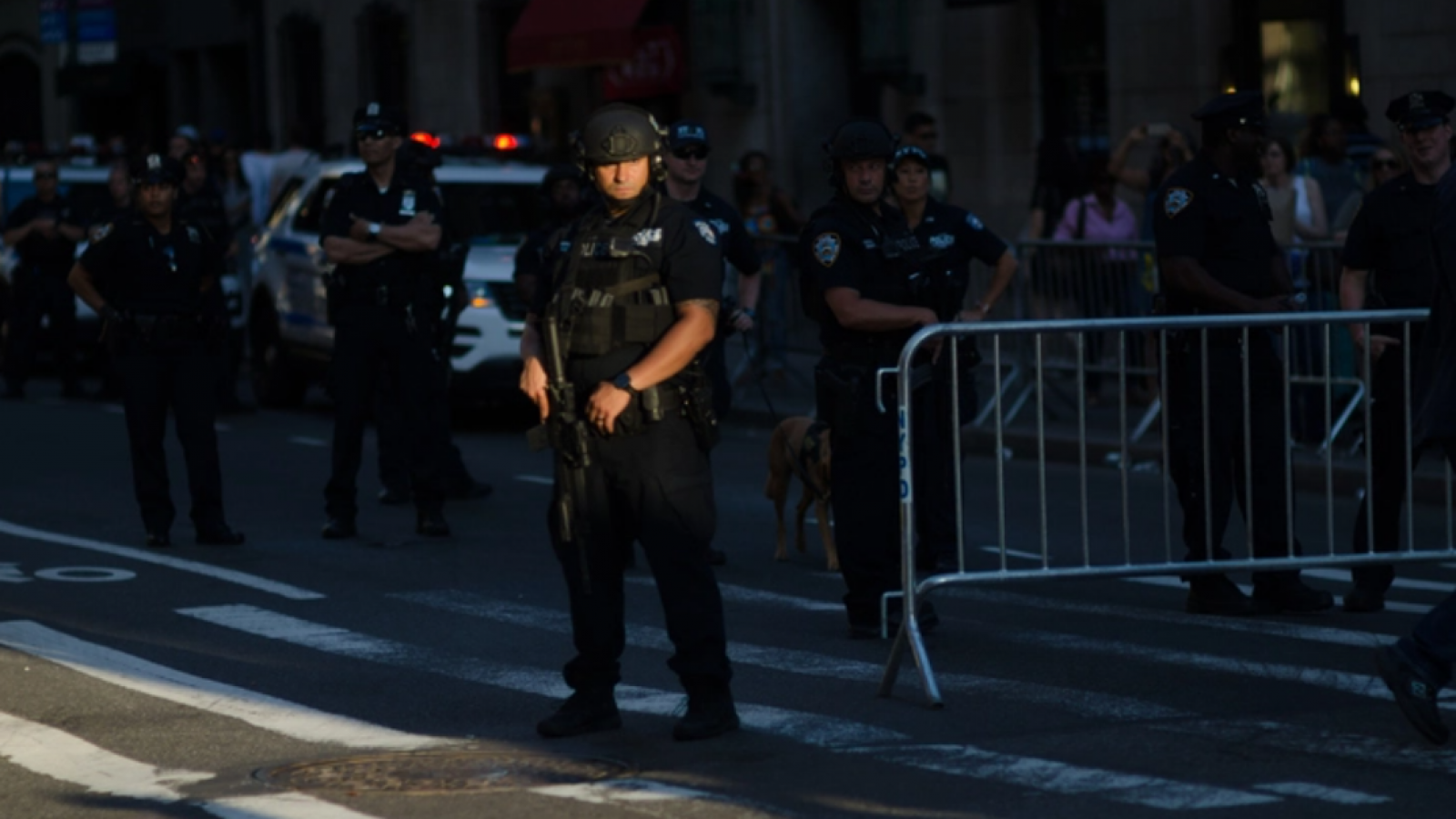 Police in front of a barricade