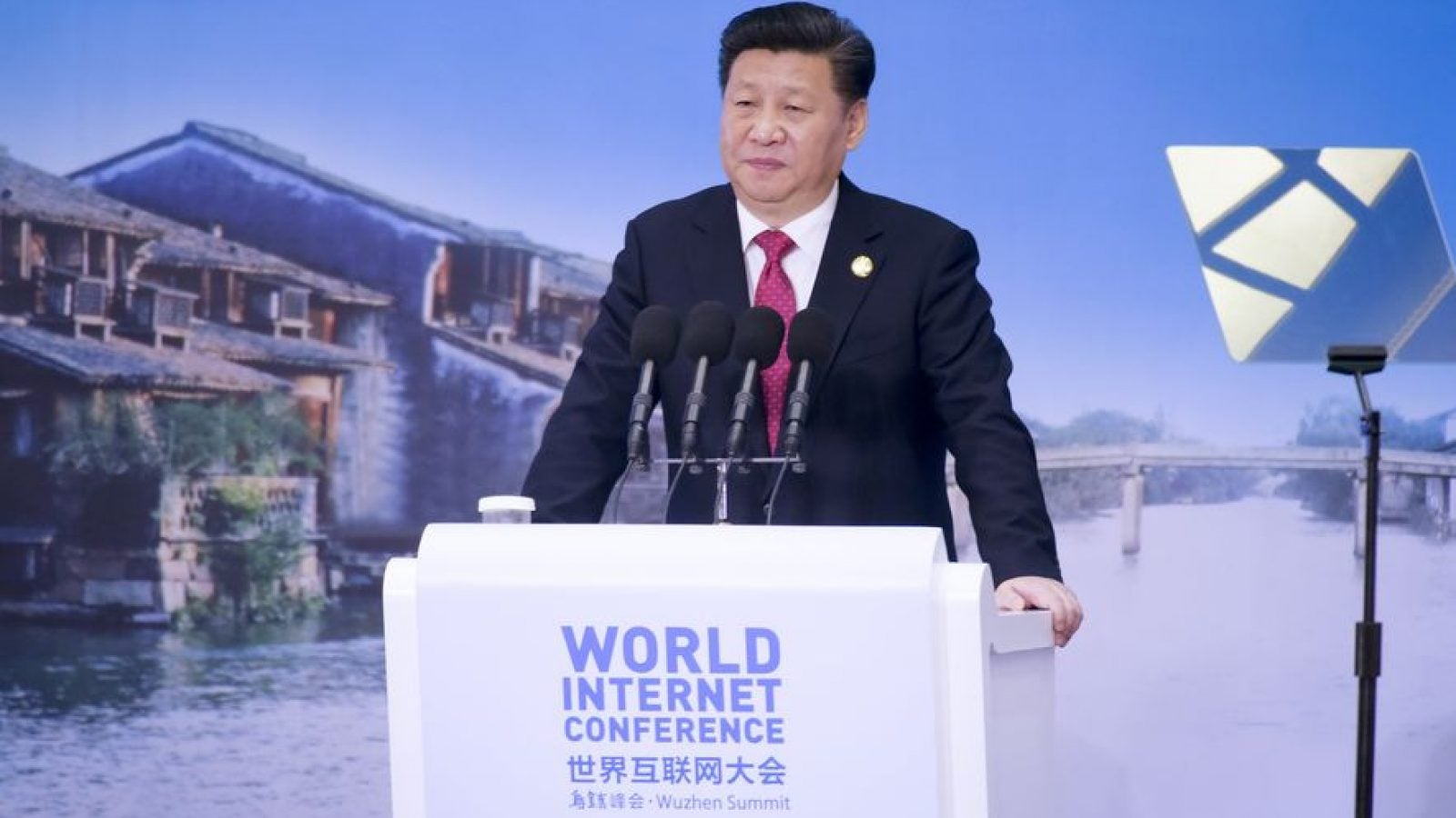 Xi Jinping stands behind a podium that says &quot;World Internet Conference&quot;