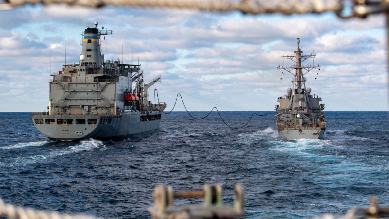 Two large naval ships at sea