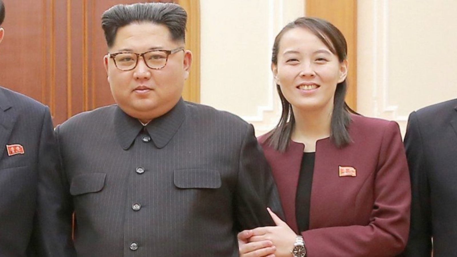 Kim Yo Jong holds Kim Jong Un&#039;s arm as they pose for a photo